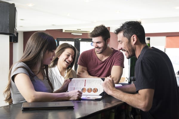 Synthetic Waterproof Menu Printing Customers enjoying restaurant menu selection